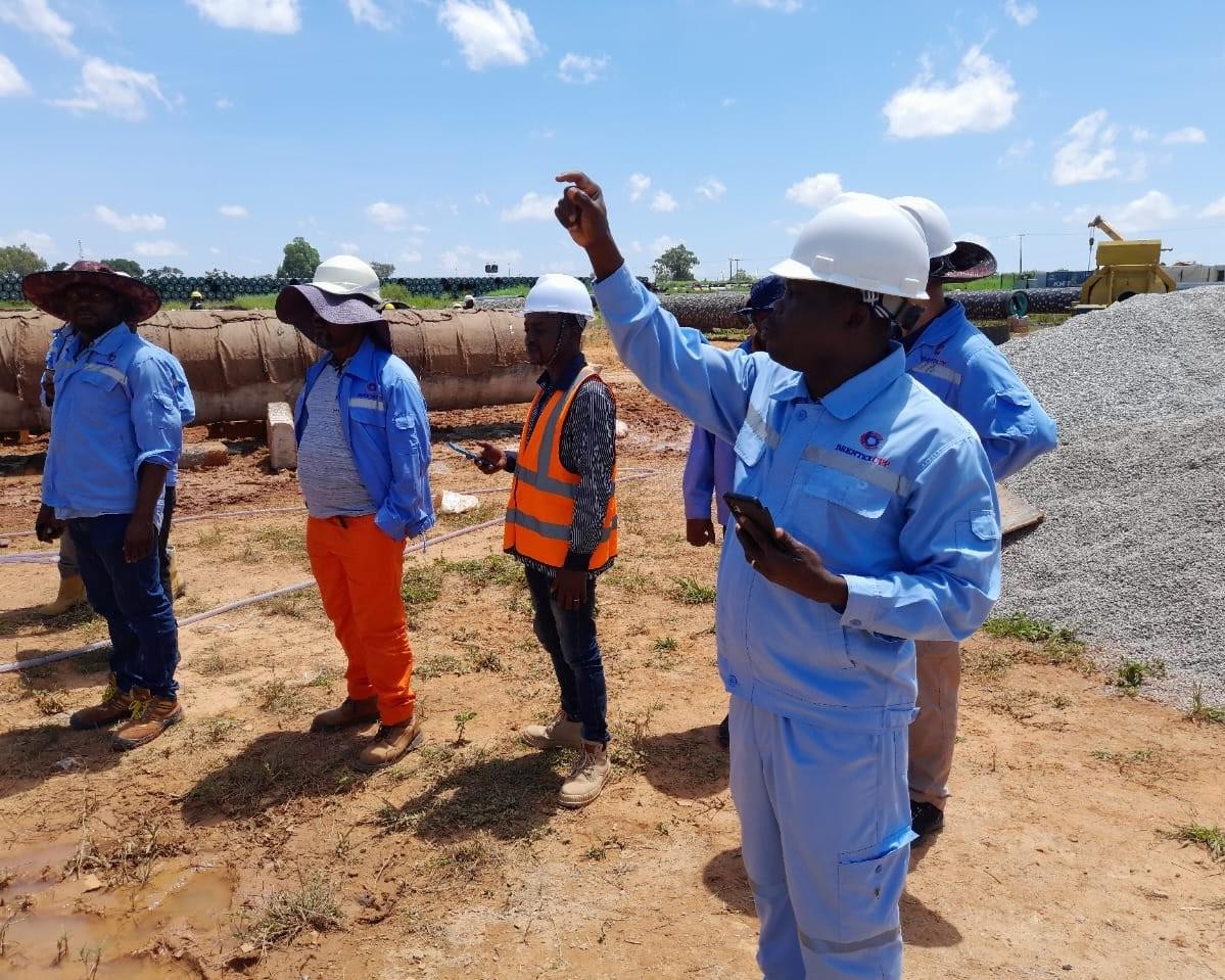 Al-Figir technical team in safety gear