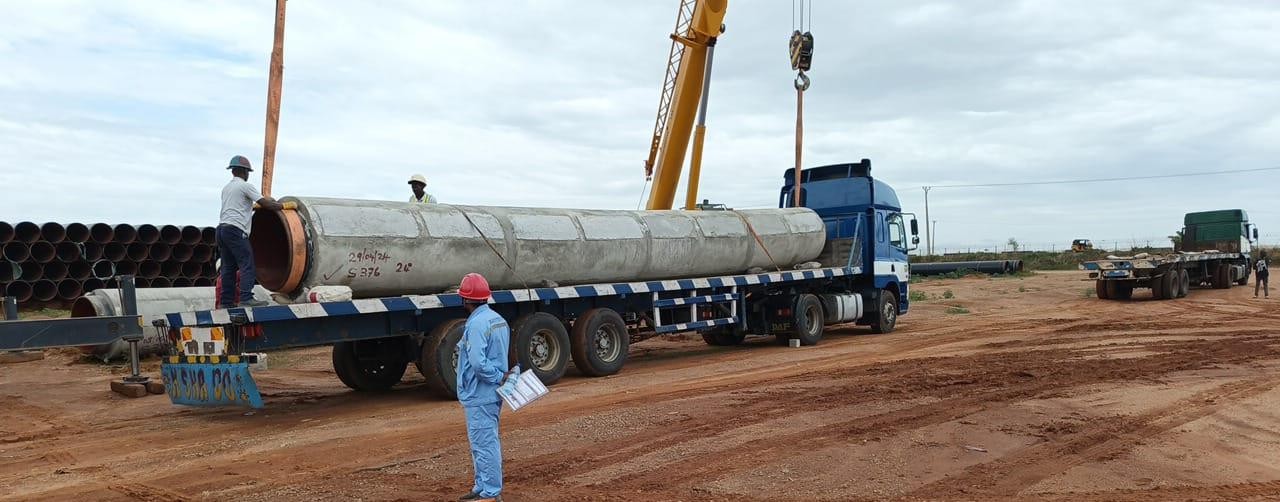 Loading of pre-cast CWC Pipe to site view 1